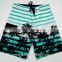 coconut tree print fabric ready-made board shorts for men taking a walk on the beach