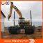 Dredging excavator with premium engine