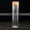 clear plastic test tube with cork