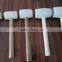 white colored rubber mallet hammer with wooden handle