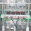 Hot sale low price of food/beverage/spices/health products glass bottle/jar automatic straight liner vacuum capping machine