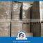 Laminated grey paperboard for industrial wrapping