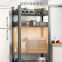 The KITCHEN FLOOR MULTILAYER CAN be moved TO receive a shelf to store a shelf microwave oven to buy a shelf