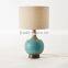 wholesale round base decorative blue poly table lamp with beige cylinder linen shade