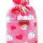 rubber hot water bottle with pink dots fleece cover