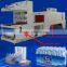 Fully automatic small shrink wrapping machine