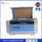 Hot sale ! cheap CO2 Up and Down Table Laser Cutting and engraving Machine for jinan China