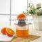 2016 New Design Hand Juicer Plastic Fruit Squeezer Orange Juicer Juice Squeezer with Measuring Storage Cup