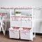 wooden folding ironing board in cabinet