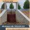 Hidden pole cast iron gate, cast iron inlaid copper round gate, wall mounted installation with manual electric hoist at the entrance of the gate