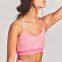 Ladies' santoni seamless knit quick dry & wicking cross back mid support sports bra.