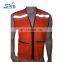 High visibility orange-red mesh pockets reflective fluorescent orange safety vest