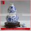 white and blue porcelain bottle gourd shaped bottles