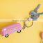 pink car shape keychains, custom made car keychains, custom made pink car shape keychains manufacture
