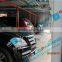 Hydraulic driven steady and smooth motion lift-sliding puzzle parking