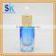 wholesale golden glass cosmetic bottle with pump