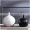 Matt round narrow neck simple black and white ceramic flower vase