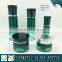 Green coloured cosmetic glass bottle and cosmetic glass jar