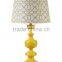 modern poly art decorative table lamp with yellow lampstand and round shade for home decor