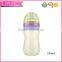 China OEM Plastic Feeding Bottle with Arc-shaped Design
