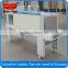 Shrink tunnel wrapping machine
