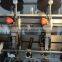 Semi-automatic book saddle stitching machine
