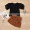 2020 Hot Sale New Creative Pure White Feather Sleeve T-shirt + Metal Button Corduroy Short Skirt Set