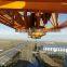 Tower crane with hydraulic self-raising mechanism