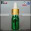 glass cosmetic serum bottle , electroplating green essential oil bottle