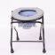 Elderly pregnant woman folding bath chair with commode
