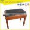 2015 Brown adjustable piano bench with leather stool surface