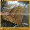 Yellow wooden sandstone wall