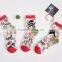 cheap young man fashion camo design non slip dots socks