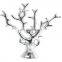 silver metal tree sculptures