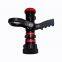 Handheld fire hose nozzle with machino female coupling