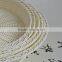 Natural wicker white round gift basket in supermarket