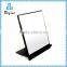 unframed small standing table mirror