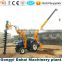Wheeled type electricity pole drill machine mounded on tractor