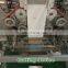 Automatic 500g 1kg coffee beans quad seal pouch weighing and packing machine