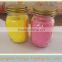 Clear mason jar with assorted colour wax/scents