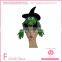 Green withes weared a black hat shaped halloween plush fabric hat for children