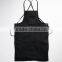 Black canvas work apron with crossback straps