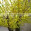 Yellow silk cherry blossom tree with artificial flower