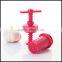 China supplier red color mashed garlic press wholesale/Hot sale garlic spread tools manufacturer/OEM Unique garlic spread press