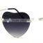 Rimless heart shape sunglasses with mirror lens .