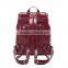 All purpose style bags leisure backpack, close by hook and tassel/fringe, nice burgundy color