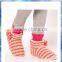 pink and beige stripe knit warm indoor boots with big pom-pom