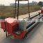 Four-roll type concrete pavement paving leveling machine for road construction