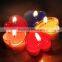 Hand made mouth blown heart shaped clear and red glass candle holder with different color candles