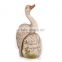 Cement swan for garden decoration and garden indicator